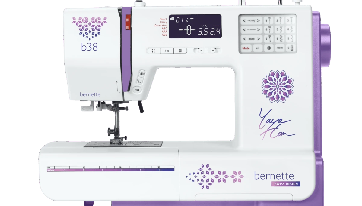 Exact purple-accented b38 Yaya Han manufacturer product photograph. The image shows the machine; its additional walking-foot set and cutting tools are not pictured.